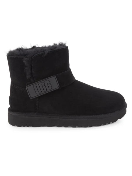 Botines con forro de piel de oveja y tira con logo Mini Bailey de UGG